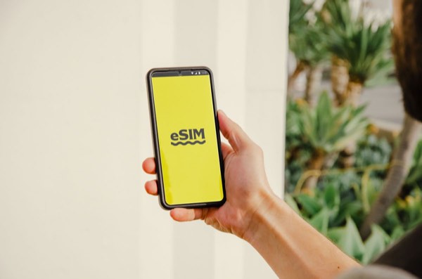 A phone screen showing an eSIM installation